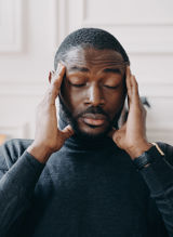 Hvordan lindrer jeg hodepinen, og kan jeg forhindre den?